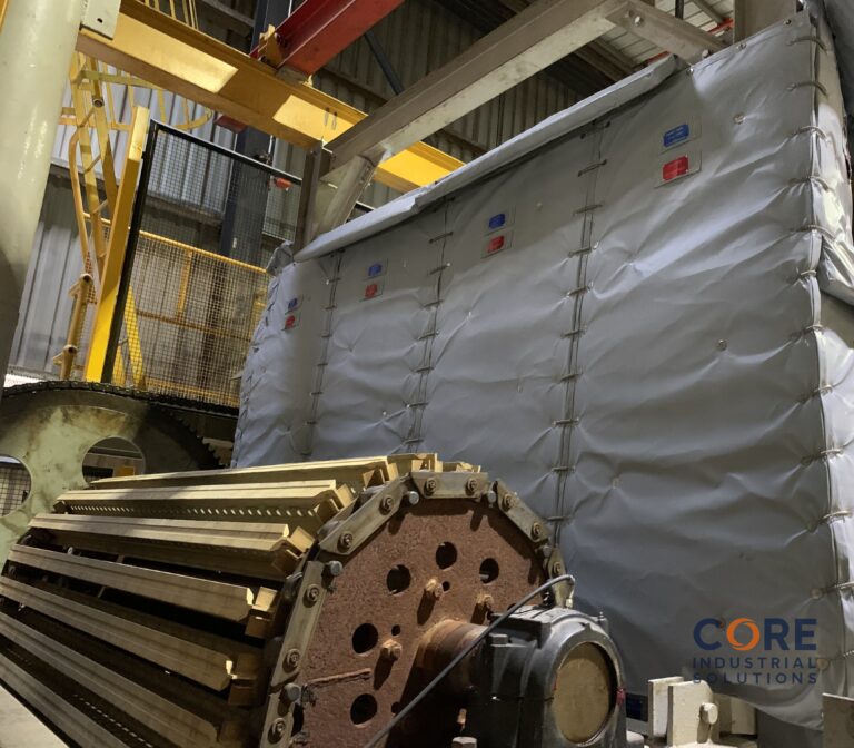 Removable insulation blanket on dairy processing storage tank