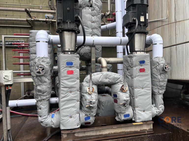 Insulation jackets fitted to vertical industrial valves and piping